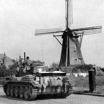 Guards Cromwell moves past a windmill