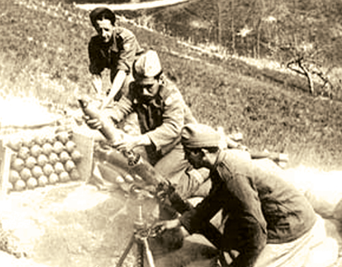 The men of the BEF prepare to fire a mortar round