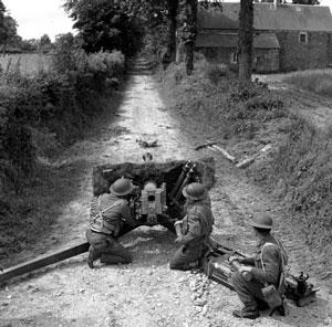 6 pdr in a narrow lane typical of Normandy