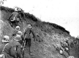 Romanian Infantry climb a steep bank