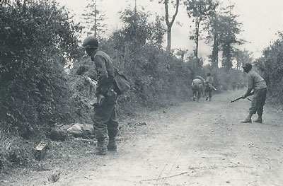 Infantry clear the bocage