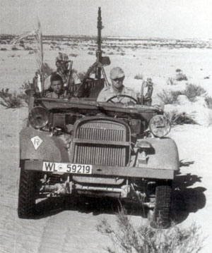 Fallschirmjäger with one of the few transport vehicles they had in the desert.