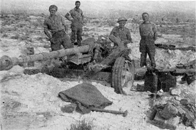 Men of the 24th Battalion with one of the captured 7.5cm PaK40s at Tebaga Gap