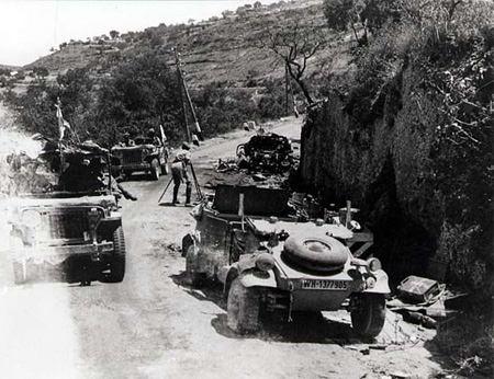 Sicilian road blocked by destroyed Kubelwagen Sicilian road blocked by destroyed Kubelwagen