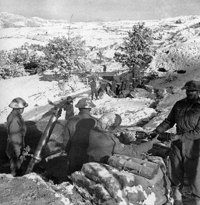 Indian troops take up positions in the mountains.