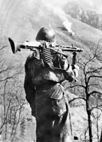 Italian RSI soldier with his German supplied MG-42.