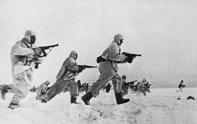 Soviets in winter camouflage advance on the Axis positions