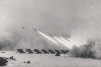 Heavy 300mm rockets launched from M-30 frames soften up the Fascists before the assault begins!