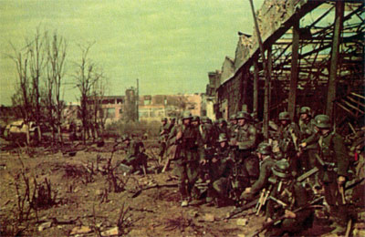 Grenadiers re-group near a ruined factory in Stalingrad