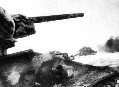 Soviet T-34 tanks and riflemen on the move