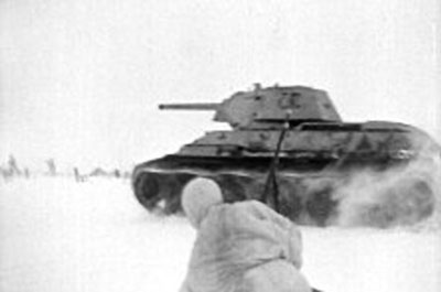 Soviet T-34 advances through the snow
