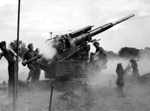 The British OQF 3.7" Anti-aircraft gun in action