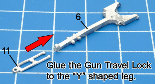 The Gun Travel Lock attaches to the "Y" shaped Leg