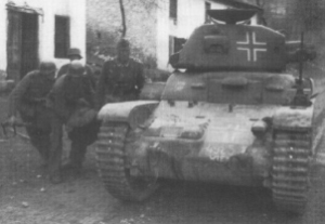 A Renault R-35 in German service with the command cupola removed and the two-piece hatch fitted directly on the turret
