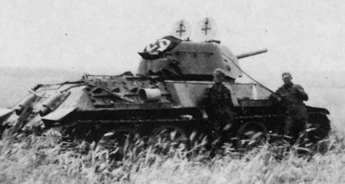 T-34 mod 1942/43 using a flag that’s tied down on the rear panel of the turret.