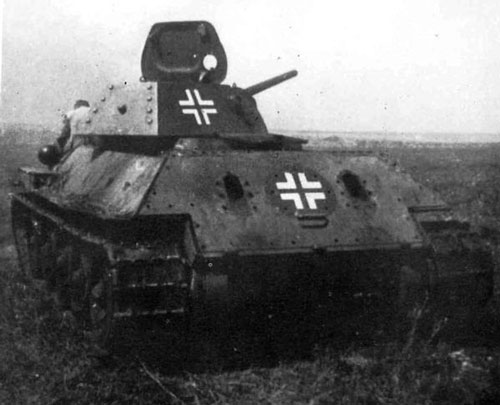 T-34 mod 1941/42 using a German Cross on the side (Rear section) of the turret, and on the rear panel of the tank