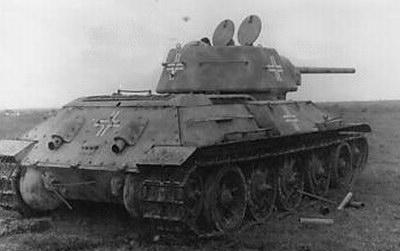 T-34 mod 1942/43 using a German Cross on the side (Front section) of the turret, on the rear panel of the turret, & on the rear panel of the tank and on the side (Mid section) of the tank.