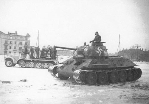 T-34 mod 1942/43 using a Swastika on the side (Front section) of the turret, on the side (Mid section) of the turret & under the barrel of the tank.