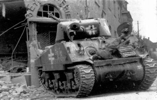 M4 Sherman with some writing on the side (Front section) of the tank. “Beute Panzer” “Captured Tank”