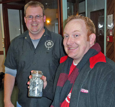 Rob Sadler (right) picked the the number of bits in the jar