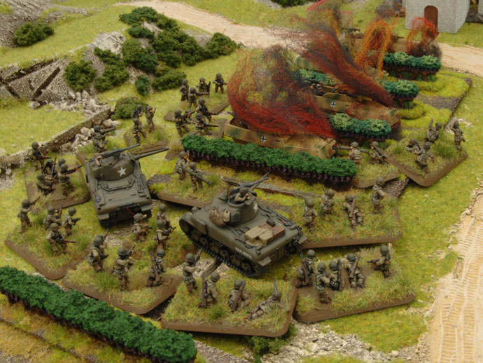 The Assault platoon swarm the HG halftracks
