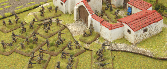 The Assault Platoon advance with the Company Commander on one flank...