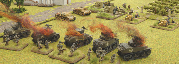 The I&R platoon take up positions behind the destroyed Stuarts.