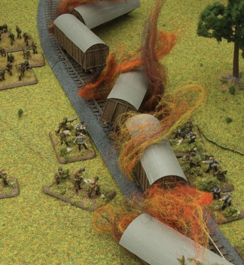 2nd and 3rd Platoons set charges and destroy the Soviet train.