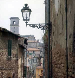 A view down one of the narrow streets of Monterotondo of Orsini Castle’s tower.