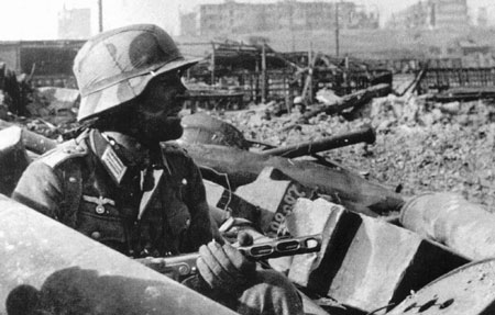 German soldier in the rubble of the Stalingrad rail yards