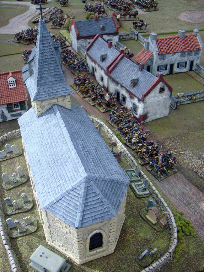 French infantry march past Plancenoit church