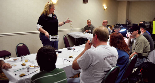 Dorothy Catapano briefs one of her classes before they get started on painting tanks