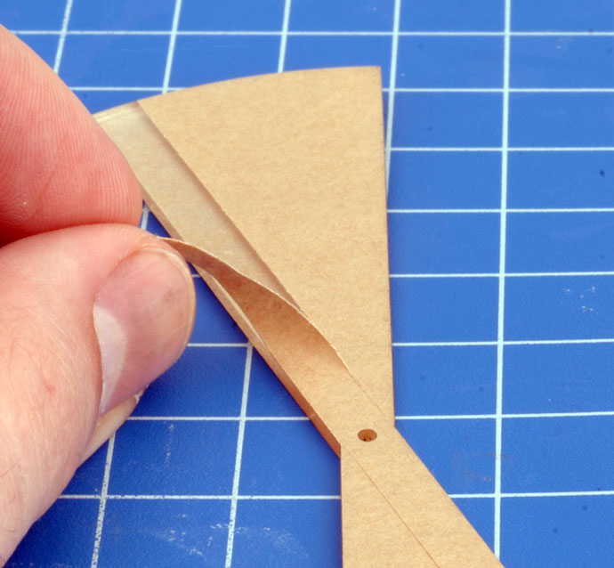 Carefully remove the protective paper.