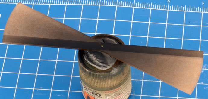 The applied light overspray of black paint on the rotor. The applied light overspray of black paint on the rotor.