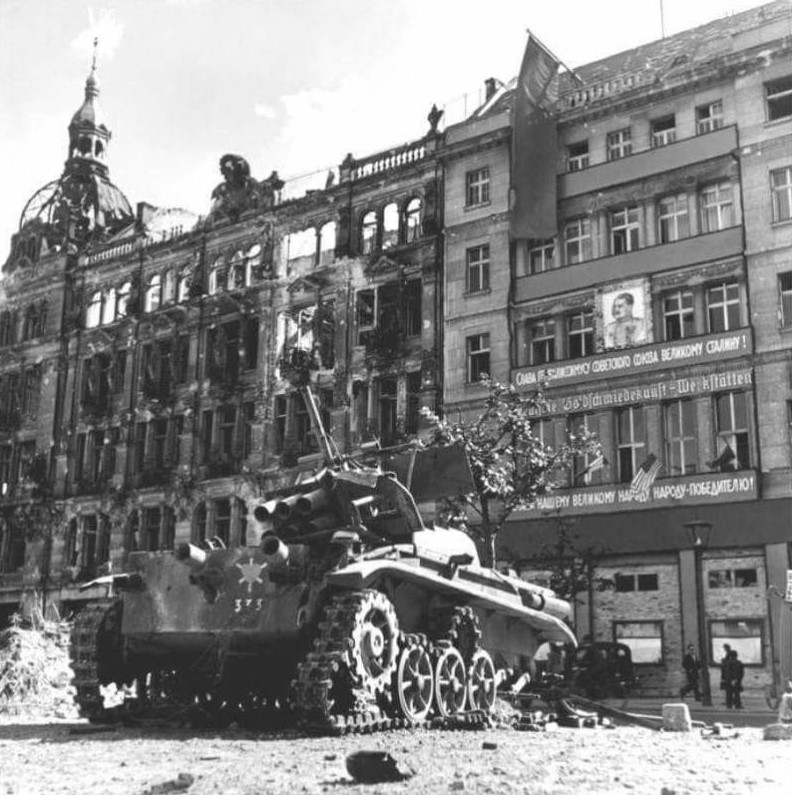 A destroyed Bedbug left in the streets of Berlin May 1945, in front of an Allied occupied building.