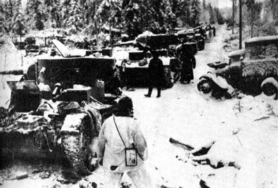 Finnish Soldiers Inspecting Soviet Tanks