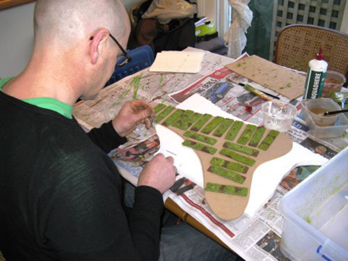 Andrew finishing off the trees.