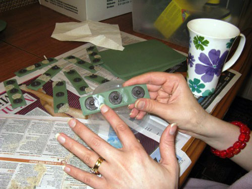 Sanding the tree bases.