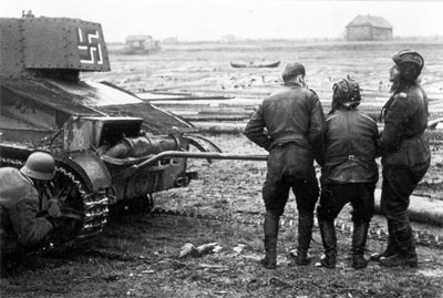 Finnish tank crew fixing T-26