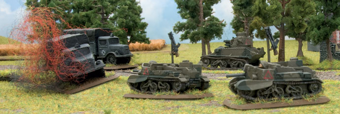 A Light Tank Mk VI B with Scout Carriers
