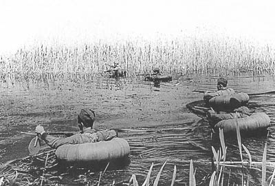Soviet troops assault across a river