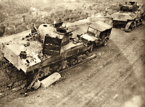 South African Sherman III tanks knocked on a road in Italy