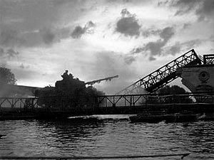 A Firefly crosses a pontoon bridge