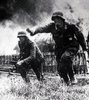 German troops escape a buring village