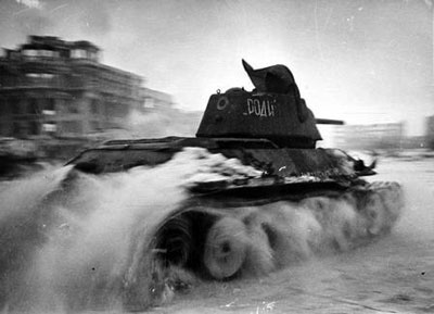 T-34 drives through the snow covered streets