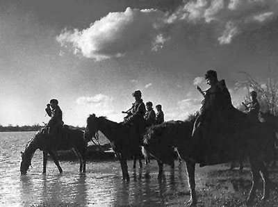 Soviet cavalry stop to water their horses