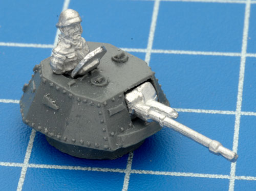 The command figure sitting flush with the top of the turret