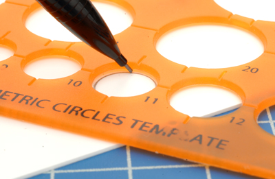 Using a stencil to mark out the shape of the disc