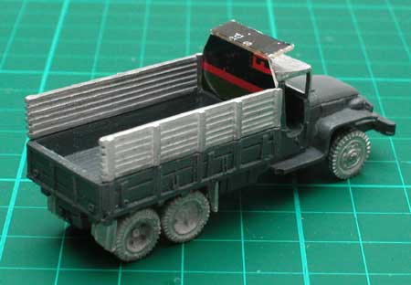 Tray back and cab shield