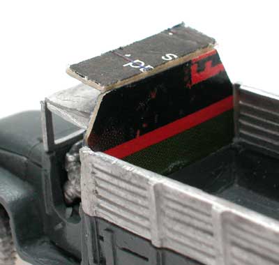 Tray back and cab shield